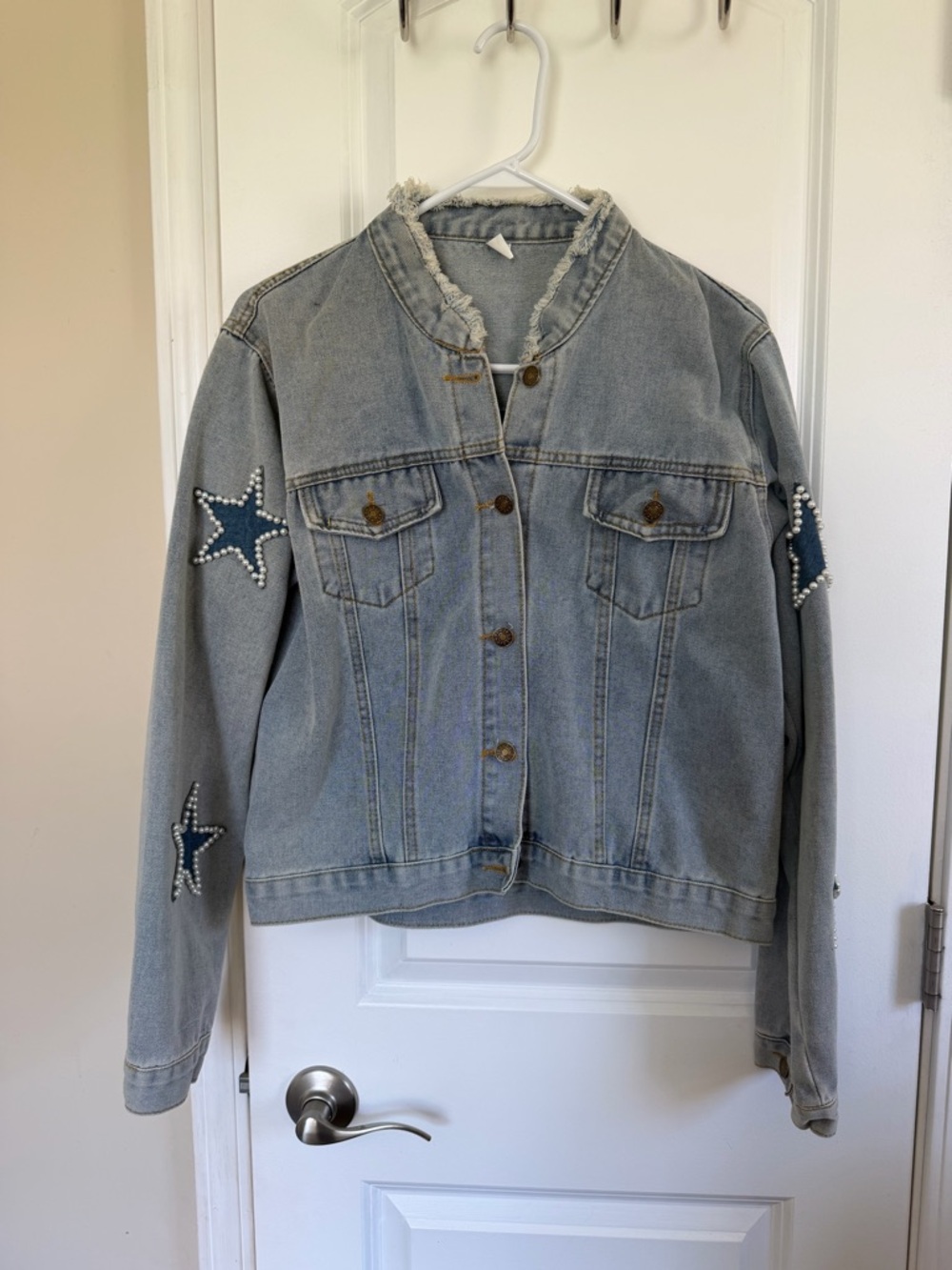 Women’s Light Blue Denim Jacket with Star Embellishments